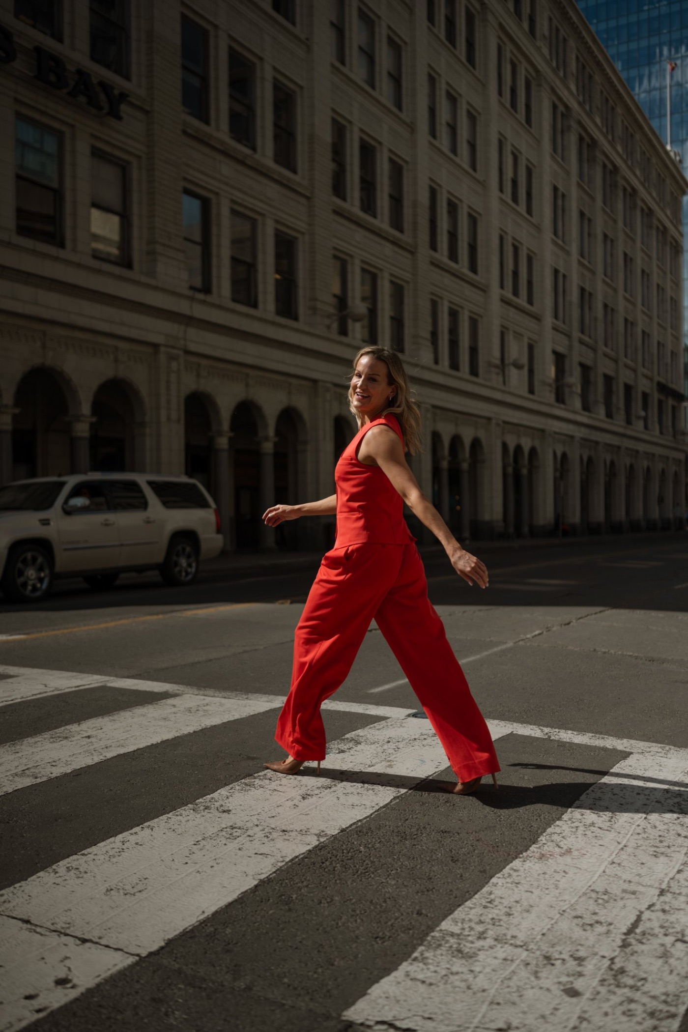 Dr. Marie Claire Bourque in a red suit